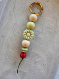 Schlüsselanhänger · Grün · Beige · Rot · Blume
