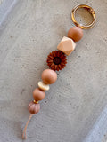Schlüsselanhänger · Braun · Beige · Blume