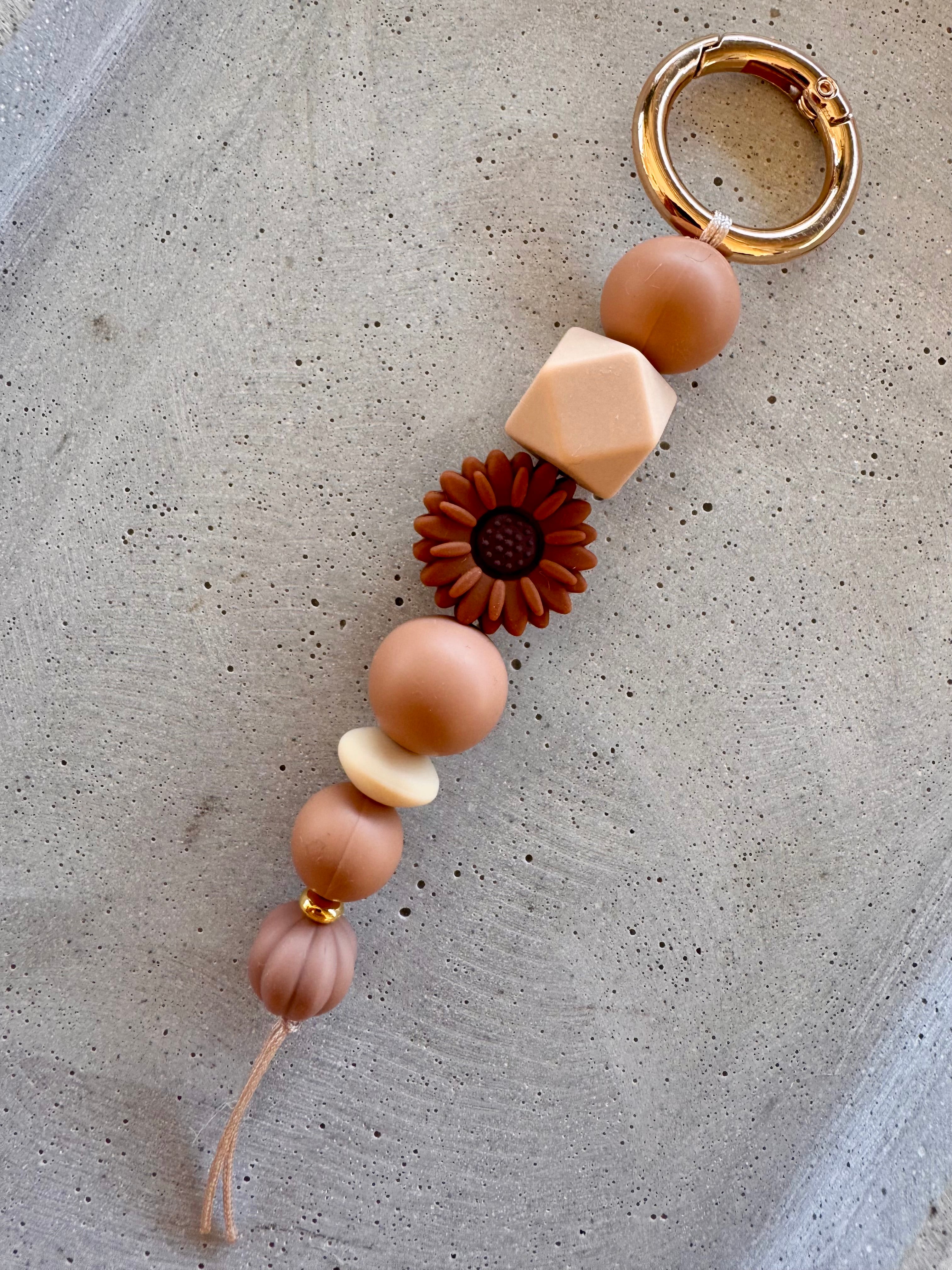 Schlüsselanhänger · Braun · Beige · Blume